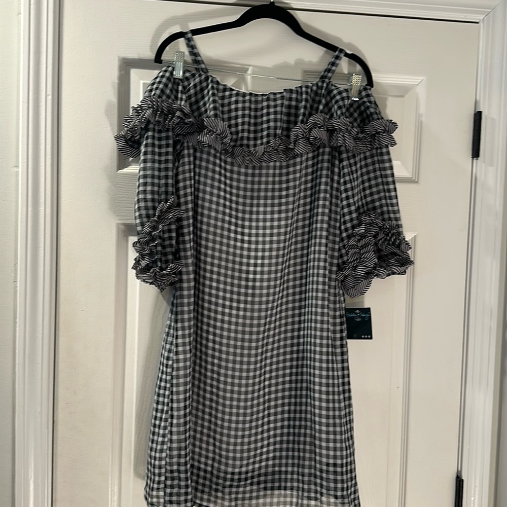 Brand new size 8 off the shoulder dress.